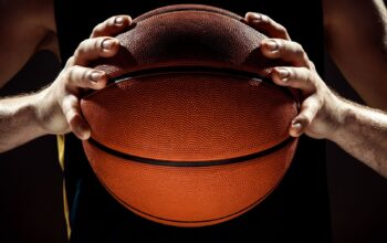 A man holding a basketball