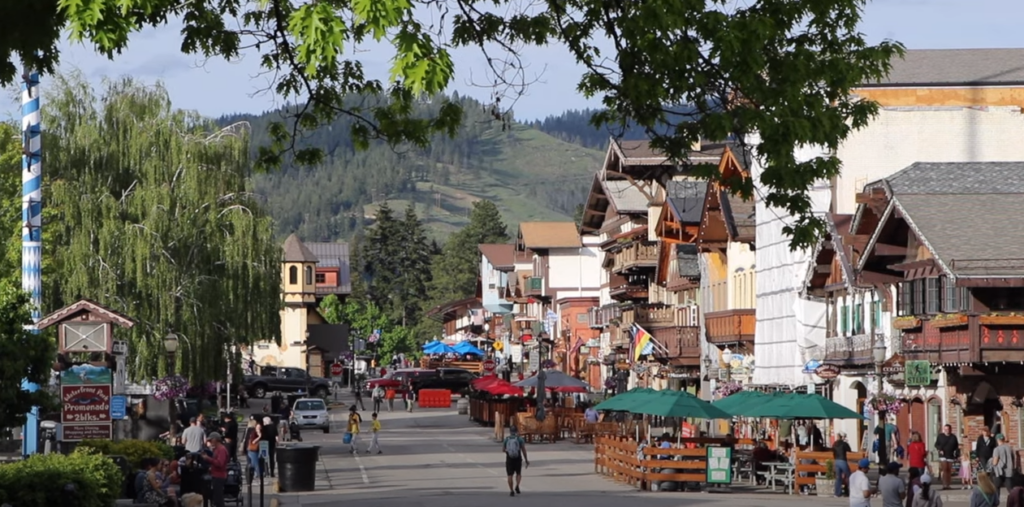 Street with Buildings, Vendors, and People Walking